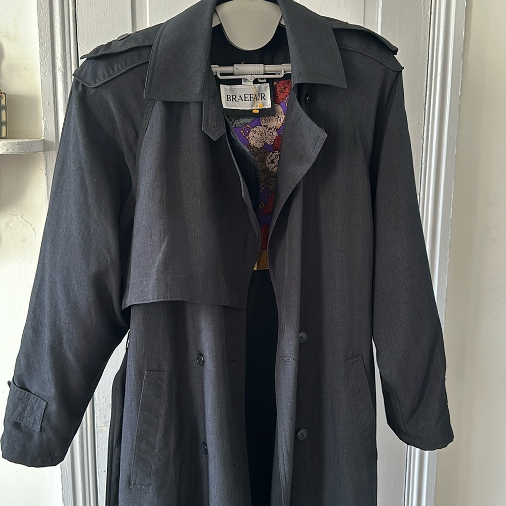 Fantastic vintage black trench coat with removable inner jacket.